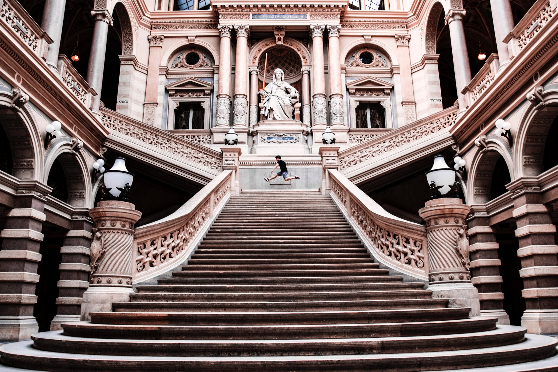 man on gray concrete staircase